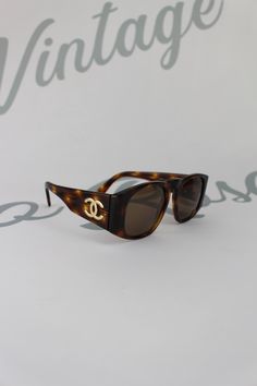 Vintage Chanel Tortoise Shell Look Frame Sunglasses Luxury Classic Brown Sunglasses, Retro Brown Formal Sunglasses, Retro Brown Sunglasses For Formal Occasion, Vintage Brown Sunglasses For Formal Occasions, Brown Retro Sunglasses For Formal Occasions, Brown Retro Formal Sunglasses, Vintage Tortoiseshell Sunglasses With Gradient Lenses, Vintage Tortoiseshell Wayfarer Sunglasses, Vintage Chanel Clothing