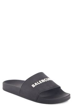 Sharp branding tops a stylish Italian sandal with laid-back appeal. Slip-on style Rubber upper, lining and sole Made in Italy Men's Shoes Italian Sandals, White Balenciaga, White Shoes Men, Black Balenciaga, Balenciaga Logo, Black And White Shoes, Balenciaga Black, Balenciaga Mens, Balenciaga Shoes