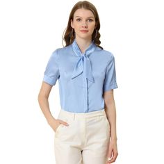 This shirt looks applicable to everyday work clothes in addition to dress-up. The silky fabric shapes this shirt with a tie-neck collared neckline and short sleeves. The curved hem gives it a neat finish over pants. The tie-neck adds casual-inspired sophistication, while soft fabric gives it an elegant, feminine shape. This elegant satin shirt features a tie-bow neck and short sleeves, making it a versatile addition to your wardrobe. Suitable for various occasions including work, office, formal Solid Short Sleeve Blouse For Office, Short Sleeve Blouse For Office, Collared Short Sleeve Shirt For Work, Solid Collared Short Sleeve Shirt For Work, Collared Short Sleeve Shirt For Work With Placket, Semi-formal Office Lady Shirt, Short Sleeve Shirt With Button Closure For Work, Workwear Short Sleeve Shirt With Button Closure, Solid Color Semi-formal Office Shirt