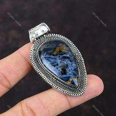 Classic Sterling Silver Pendant Gemstone, Artisan Gemstone Pendant With Accents, Bohemian Faceted Pendant Jewelry, Artisan Sterling Silver Pendant Gemstones, Pietersite Jewelry, Blue Nile Jewelry, Blue Nile, Petrified Wood, Handmade Pendant