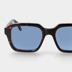 Sunglasses Unisex TBD Eyewear Lino Eco Dark Havana | Blue. Unisex 70s aesthetic, this model combines an iridescent dark amber frame with classic blue lenses. Entirely made in Italy with respect for the environment, using bio acetate and bio-based lenses. Lens: 100% UV protection. Filter: Category 2 Retro Blue Wayfarer Sunglasses, Retro Blue Square Frame Sunglasses, Retro Blue Sunglasses With Gradient Lenses, Retro Blue Polarized Sunglasses, Retro Blue Sunglasses With Polarized Lenses, Sustainable Sunglasses, 70s Aesthetic, Blue Lenses, Unisex Sunglasses