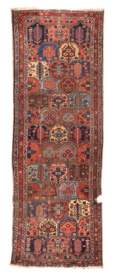 an old rug with many different colors and patterns