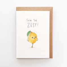 a greeting card with an illustration of a lemon on the front and words, you're the zest