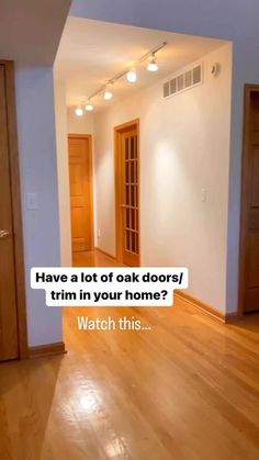 an empty room with wood floors and white walls has a quote on it that reads, have a lot of oak doors trim in your home? watch this