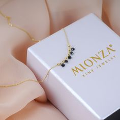 Elevate your style with our 14k Gold Onyx Necklace, featuring five tiny 3mm black stones on a 16.5" chain. Its adjustable 1.20" extender and secure spring-ring clasp ensure a perfect fit. This dainty necklace is ideal for enhancing any formal attire.PRODUCT DETAILSMaterial: 14K Solid Gold Choice of Gold Color: Yellow Gold, Rose Gold, White GoldNecklace Length: 16.5 inches (extension chain 1.2 inches)Onyx diametes: 3 mmClosure: Spring ringChain style: Cable Black Stones, Solid Gold Necklace, Onyx Necklace, White Gold Necklaces, Station Necklace, Onyx Stone, Formal Attire, Rose Gold Necklace, Black Stone