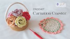 two crocheted baskets with flowers sitting next to each other