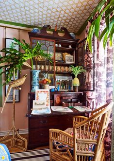 a living room filled with lots of furniture and plants on top of it's shelves