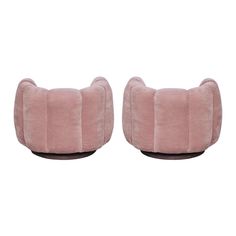 two pink chairs sitting next to each other