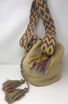 "11\"high,10 1/2\"across,Strap is 37\" total in length/2 1/2\"wide/smoke free environment/ good condition/clean (P9)" Bohemian Beige Bucket Bag, Artisan Multicolor Bucket Bag With Adjustable Strap, Multicolor Bucket Shoulder Bag With Adjustable Strap, Handmade Crossbody Bucket Bag For Festivals, Artisan Bucket Tote Bag For Festivals, Bohemian Bucket Bag With Adjustable Strap, Handwoven Bucket Bag For Everyday Use, Bohemian Bucket Bag With Adjustable Strap For Everyday, Artisan Bucket Bag For Everyday