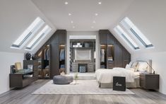 an attic bedroom with white walls and wood floors