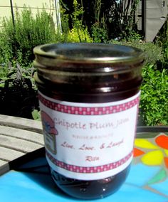 a jar of jam sitting on top of a table