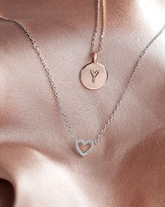 Our open heart pendant is a timeless expression of love. It’s the sweetest gift for yourself or for someone you hold close to show them just how much you care for them. With sparkling cubic zirconia and a dainty chain, this piece is perfectly flirty and feminine. 14KT yellow, rose or white gold platedAAAAA Cubic ZirconiaMeasurements: Diameter: 8mm (.3”)Chain length: 18”+2” extender Open Heart Necklace, Open Heart, Sweet Gifts, Rose Gold Necklace, Chain Lengths, Heart Necklace, Heart Pendant, Cubic Zirconia, Sparkle