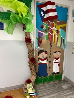 a door decorated with paper flowers and an image of two people on the front porch