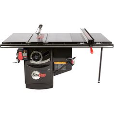 the sawstop table saw is sitting on top of a workbench