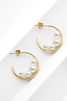 These Pearl C-Hoop Earrings are an essential accessory for any wardrobe. Crafted from highly polished sterling silver, the earrings feature a classic C-shaped hoop design with a single ivory pearl in the center. The timeless look and lightweight design make them ideal for any occasion. Material: Copper, 18k gold plated, chrome plated, artificial pearl Product measurements: Length: 0.9 in (2.2 cm) Weight: 0.18 oz (5 g) Pearl Crafts, Ghost Mannequin, Breastmilk Jewelry, Picture Style, Aesthetic Rooms, Brooch Necklace, Quiet Luxury, Fashion Jewelry Earrings, Jewelry Inspo