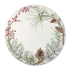 a plate with pine cones and berries on it