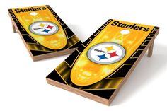 two cornhole game boards with the logo of the university of iowa