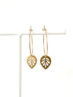 Lovingly made earrings made of stainless steel with brass pendant. Motif: Sheet Material: - The Creole is made of stainless steel & is clamped for closing.  According to the manufacturer, cadmium-, lead- and nickel-free. - The pendant is made of brass - Size: 25 mm the creole, about 38 mm the complete earring Other colors and motifs available. The jewelry is new and not worn. ♥ ♥ ♥ Made with a lot of love. ♥ ♥ ♥ Unevenness, created in the manufacturing process, underlines the individuality of th Leaf Shaped Metal Jewelry For Gifts, Leaf-shaped Metal Jewelry As Gift, Handmade Leaf-shaped Everyday Jewelry, Handmade Everyday Leaf-shaped Jewelry, Leaf-shaped Metal Jewelry For Gifts, Everyday Handmade Leaf-shaped Jewelry, Gold Leaf Hoop Earrings, Gold Leaf-shaped Hoop Earrings For Gift, Minimalist Nickel-free Leaf-shaped Earrings