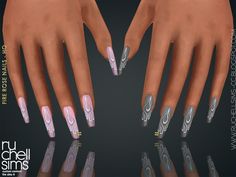 two hands with white and silver nail designs on them