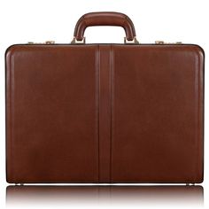 This stylish attaché case by McKlein will keep you organized on the move without compromising your style. Made from leather, it features an organizer pocket and a built-in lock to keep your belongings secure. It has a latch closure for easy retrieval of your items. Color: brown. Gender: male. Age Group: adult. Pattern: Solid. Luxury Vintage Brown Briefcase For Travel, Brown Leather Briefcase Rectangular Case, High-end Brown Rectangular Briefcase, Vintage Brown Leather-lined Briefcase, Vintage Brown Leather Briefcase, Rectangular, Keep Life Simple, Christmas Wear, Fall Over, Sunglass Hut