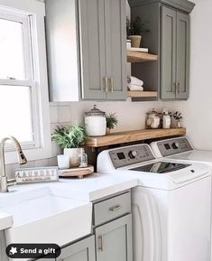 a washer and dryer in a small kitchen