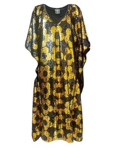 You don't have to wait until spring to bloom, you can get the Any Old Iron Mini Quant Kaftan and bloom all year round! This golden kaftan of happiness has a v-neckline and is decked out in a mini floral pattern from the neckline to the hem. The stunning gold sequins flip to black and the black sequins flip to the vibrant gold. It is perfect for any vacation, event, and performance! The light weight material is super breathable and soft on the skin. This Mini Quant Kaftan is literally the definit Bohemian Kaftan With Gold Embroidery, Bohemian Embroidered Gold Kaftan, Black Printed Short Sleeve Kaftan, Festive Black Kaftan With Gold Embroidery, Bohemian V-neck Multicolor Print Kaftan, Kate Bosworth, Miranda Lambert, Gold Sequins, To Wait