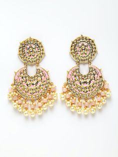 These gorgeous pink crescent chandbali earrings come with artificial kundan stone studs & beads, are gold-plated, and are secured with a post and back closure. These handcrafted chandbalis can be styled with any ethnic outfit, or an evening outfit to complete a dazzling look. Product color may vary based on the monitor or screen you are using.See FAQ for more details. Size Length: 11 cm Details Material: BrassStones: Artificial Stones & BeadsPlating: Gold-plated Pink Chandbali Bridal Earrings Gift, Festive Meenakari Beaded Chandbali Earrings, Pink Round Danglers For Wedding, Pink Kundan Chandelier Earrings For Party, Festive Kundan Beaded Chandbali Earrings, Chandbali Beaded Earrings For Gift, Festive Kundan Chandbali Beaded Earrings, Kundan Chandbali Beaded Earrings As Gift, Pink Kundan Dangle Bridal Earrings