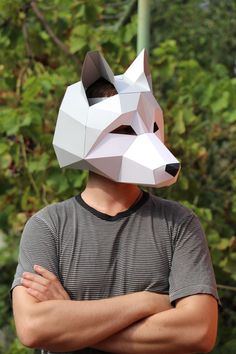 Low poly 3D mask Wolf, easy to assemble. 12 pages A4 PDF + Step-By-Step Instruction + Visual Instruction All masks are standard size and fit for adults. But if you zoom out by 10% or 20% when you print, the mask will be smaller and better suited for children. There is a lot of free space inside the mask, so a cardboard ring is used to attach to the head, a ring template is included. You can easily fit the head ring to your size and then simply glue it inside the finished mask. The ring must be g Wolf Head Mask, Diy Wolf Mask, Wolf Mask Diy, Wolf Mask Template, Mask Wolf, Low Poly Mask, Cardboard Mask, Wolf Costume, Wolf Mask