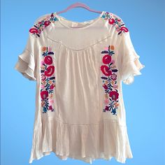 Umgee Bohemian Style Embroidered Top Size Large Like New Condition. Never Worn , Without Tags . I Pictured The Top As An Outfit With A Pair Of Shorts . If You Purchase The Top I Can Add The Shorts For Free. The Jean Shorts Are A Size 25 Mid Rise And Fringe Cutoff . Spring Bohemian Embroidered Top With Floral Details, Bohemian Embroidered Top With Floral Design For Spring, Bohemian Floral Embroidered Top For Spring, Summer Multicolor Embroidered Top With Embroidered Hem, Spring Short Sleeve Blouse With Resham Embroidery, Summer Embroidered Top With Floral Print, Multicolor Embroidered Floral Top For Summer, Multicolor Embroidered Floral Print Top For Summer, Bohemian Embroidered Hem Short Sleeve Top