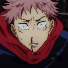 a man with pink hair and blue eyes wearing a red hoodie looking at the camera