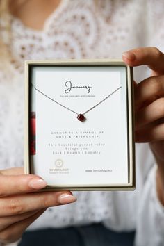 "∙ ∙ ∙ ∙ ∙  K E Y - F E A T U R E S ∙ ∙ ∙ ∙ ∙  This beautiful birthstone necklace is handcraft with Swarovski crystal element, making this a keepsake they will always cherish.. Chic yet classic,  this birthstone necklace is perfect for all gifting occasion and a tempting treat for yourself. Necklace Dimensions: Charm Width: 6mm;  Metal Type: Brass with 18K White Gold Plated Allergen-free, Nickel-Free, Cadmium-Free, Lead-Free From one of the SYMBOLOGY family  - Birthstone Collection - made with love.  ∙ ∙ ∙ ∙ ∙ G I F T S ∙ ∙ ∙ ∙ ∙  Each piece is individually wrapped in a branded SYMBOLOGY gift box.  we are happy to ship directly to the recipient. Every single piece paired with a SYMBOLOGY gift card. If you would like a gift note to be written on the SYMBOLOGY card for you, please leave the Elegant Red Birthstone Necklace For Gift, Red Birthstone Necklace For Valentine's Day, Personalized Crystal Necklace For Valentine's Day, Garnet Pendant Necklace For Gift, Garnet Pendant Necklace For Gifting, January Birthstone Necklace, April Birthstone Necklace, Friendship Symbols, Garnet Crystal