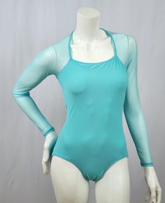 Square Halter Neckline - Aquamarine base milliskin fabric - Aquamarine stretch mesh sleeves - Open deep scoop neck back This listing includes USPS First Class Shipping throughout the US. Additional shipping charges apply to international orders. Solid Color Dance Unitard With Thumbholes, High Stretch Nylon Bodysuit With Thumbholes, Stretch Mesh Long Sleeve Bodysuit, Stretch Nylon Bodysuit With Sheer Sleeves, Stretch Mesh Bodysuit With Sheer Sleeves, Summer Long Sleeve Mesh Bodysuit, Sheer Long Sleeve High Stretch Bodysuit, Sheer Sleeves Long Sleeve High Stretch Bodysuit, Dancewear Leotard With Thumbholes