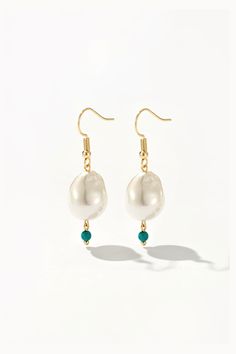 Description Adorned with lustrous baroque pearls and vibrant turquoise stone, these handcrafted pearl earrings are perfect for every occasion. Turquoise Pearl Drop Jewelry, Elegant Turquoise Pearl Drop Earrings, Turquoise Pearl Drop Earrings, Turquoise Jewelry Earrings, Turquoise Drop Earrings, Keshi Pearls, Jewelry Making Tutorials, Turquoise Earrings, Baroque Pearls