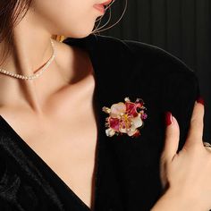 This beautiful Alloy Crystal Peony 3D Enamel Corsage is the perfect accessory to add to your outfit. The intricately designed alloy crystals and 3D enamel create a stunning peony flower that will elevate your style. Show off your sense of fashion and add a touch of elegance to any look with this corsage. Tarnish-proof Water-proof Sleep / Nap-proof Safe for sensitive skin Wear it while working out &showering Designed to wear 24/7 If there is no stock, the product will take 15 days to produce Please leave your usual email address for order contact For smooth delivery, please leave your phone number Details Materials: Alloy Stone: CZ Diamond SKU：AN24060603 Elegant Spring Gift Brooches, Elegant Enamel Flower Brooches, Elegant Spring Brooch Jewelry, Elegant Spring Brooch, Pink Crystal Brooches As Gift, Elegant Rose Gold Flower Brooches, Elegant Gold Brooches For Spring, Flower-shaped Brooch For Party, Elegant Pink Brooch With Flower Decoration