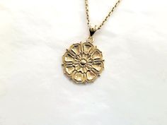 women's and men's buddhist lotus flower necklace pendant 1 made in 14k solid gold or 18k solid gold buddhist lotus flower with exquisite detail is designed as a relief. - model wears a 2.1mm 50cm chain. - free shipping on all orders - designed by carre d'or - made in south korea 14k gold lotus flower pendant necklace 1 weight pendant only 6.71g (±3%) with a 2.1mm 42cm chain 12.67g (±3%) with a 2.4mm 42cm chain 14.54g (±3%) with a 3.0mm 42cm chain 18.29g (±3%) 18k gold lotus flower pendant neckla Traditional 14k Gold Medallion Necklace, Spiritual 14k Gold Round Pendant Jewelry, 14k Gold Spiritual Round Pendant Jewelry, Spiritual 14k Gold Round Pendant, 14k Gold Pendant Medallion Necklace, Traditional Pendant Necklace Tarnish Resistant, Traditional 14k Gold Round Pendant Necklace, Spiritual 14k Gold Medallion Jewelry, Yellow Gold Pendant Jewelry With Flower Charm