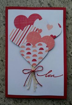 a card with two hearts attached to it