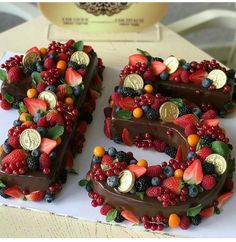 the number 50 is made out of fruit and chocolate