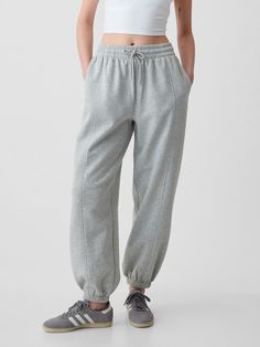 Soft cotton-blend baggy sweatpants.  Elasticized waist with drawcords.  Front slant pockets.  Elasticized hems.  * Fit: Classic.  An easy silhouette that fits close  at the waist, and is relaxed through the hips and thigh.  Models wearing Gap Sweatpants Amazon, Dark Fits, Sporty Fits, Easy Silhouette, Random Clothes, Cute Sweatpants, Baggy Sweatpants, Grey Sweats, Vintage Soft