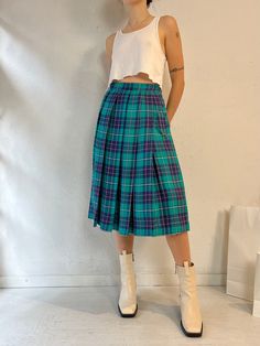 "- Vintage The Villagers to plaid pleated skirt - Buttons up the side - 100% rayon  - Made in Tawain - Tagged 6 Waist: 26\" Length: 28.5\"" Casual Plaid Pleated Skirt For Summer, Summer Plaid Pleated Bottoms, Preppy Plaid Pleated Lined Skirt, Plaid Full Skirt With Lining, Fitted Pleated Plaid Bottoms, Scottish Plaid Pleated Bottoms, Retro Pleated Bottoms For Fall, Preppy Pleated Plaid Skirt, Vintage Plaid Pleated Skirt