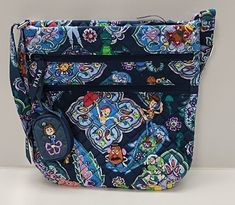 This Vera Bradley Triple Zip Hipster Crossbody bag is a must-have for any Disney Toy Story fan. The bag features a charming paisley pattern with vibrant colors and a multicolor handle/strap made of cotton material. The bag has a zip closure and measures medium in size, with a width and height that can be found in the item description. The lining material is cotton, and the bag comes with a coin purse accessory. The exterior of the bag is made of cotton material, and the lining color is blue. The bag is part of the Vera Bradley Triple Zip Hipster product line and is retired, making it a rare find for collectors. PLEASE SEE PICTURES BEFORE PURCHASE THANK YOU.   Please review all photos for condition. Please ask all questions prior to placing your order! Be sure to check out our eBay store fo Disney Multicolor Bags With Adjustable Strap, Vera Bradley Disney, Purse Accessories, Disney Toys, Paisley Pattern, Toy Story, Vera Bradley, See Pictures, Cotton Material