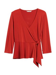 Soft and stretchy, this versatile wrap top is made in our customer-favorite matte jersey fabric.  Bonus: it's super easy to care for - throw it on the washer and dryer, no problem.  V-neck.  Wrap front closure.  Peplum hem.  Fitted - defined waist.  3/4 sleeve.  Short body length - designed for mid-rise and high-rise styles.  Body length (size S): Petite 22. 25", Regular 23. 25" Sleeve length from center back: Petite 26", Regular 26" Model: Size XS, 5'10" (178cm). Chic Stretch Wrap-style Top, Versatile Stretch Faux Wrap Top, Versatile Stretch Wrap Top, Chic Stretch Faux Wrap Top, Versatile Faux Wrap Blouse For Work, Fitted Faux Wrap Versatile Blouse, Versatile Wrap Top For Workwear, Versatile Faux Wrap Blouse For Fall, Versatile Tops With Surplice Neckline And Stretch