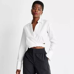 Future Collective White Side Cutout Cropped Poplin Long Sleeve Shirt With An Elastic Waist Brand New With Tags Size Large Chic Cropped Blouse From Urban Outfitters, Urban Outfitters Button-up Workwear Top, Urban Outfitters Button-up Top For Work, Casual Workwear Tops From Urban Outfitters, Urban Outfitters Casual Workwear Tops, Casual Urban Outfitters Tops For Work, Spring Collared Shirt By Urban Outfitters, Chic Cotton Blouse By Urban Outfitters, Urban Outfitters Collared Spring Shirt