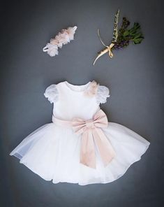 Baptism Dress Girl, Church Dress, Jr Bridesmaid Dress, Silk Satin Dress, Baptism Dress, Wedding dress, Big Bow Dress for Girl, Christening Dress For Todlers, Fancy Girls Dress, Birthday Party Dress, Formal DressWhite festive girls dress wih short sleeves. Decorated with a beautiful flowers, fastened with buttons on the back. Dress is decorated with a strap with a large bow on back. If you prefer different color of the bow please see my other listings or please contact me.Girls dress is perfect f Fitted Tutu Dress With Bow For Baptism, Fitted Tulle Baptism Dress With Bow, White Ruffled Tutu Dress For Bridesmaids, White Tulle Baptism Dress With Bow, Elegant Short Sleeve Tulle Baptism Dress, Fitted Dress With Bow For Confirmation, White Tutu Dress For Wedding, Princess-style Baptism Dress With Bow, Elegant Tutu Dress With Bow For Baptism