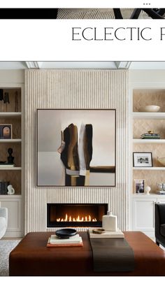 a living room filled with furniture and a fire place in front of a wall mounted painting