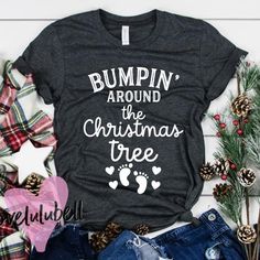 a t - shirt that says tis the season to be preggers on it