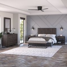 a bedroom with a bed, dressers and mirror in it's center area