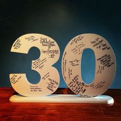 the 30th birthday cake is decorated with handwritten words