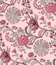 a pink and green floral pattern on fabric