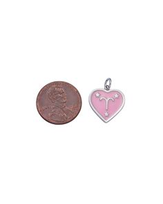 A heart shaped charm with a pink enamel zodiac design. Dimensions: 18mm Pink Heart Pendant Charms As Gift, Pink Enamel Charms For Gifts, Personalized Pink Charms For Valentine's Day, Personalized Pink Sterling Silver Charms, Pink Sterling Silver Charms For Valentine's Day, Personalized Pink Heart Charms, Pink Heart Sterling Silver Charms, Pink Heart-shaped Sterling Silver Charms, Pink Sterling Silver Heart Charm