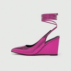 These elegant slingback pumps offer a bold, vibrant fuchsia hue, perfect for making a statement at any party. The faux snakeskin texture gives a touch of exotic sophistication, while the wrapped wedge heel ensures comfort and stability. With carefully crafted pointed toes, these shoes exude a sleek, modern vibe. The adjustable slingback strap provides a custom fit and adds an extra dash of charm. Ideal for the fashion-forward woman, these stunning pumps combine fabulous design with peerless func Spring Party Slingback Wedge Heel Pumps, Spring Evening Slingback Pumps With Wedge Heel, Spring Evening Slingback Wedge Pumps, Fuchsia Heels, Red Carpet Party, Work Formal, Modern Vibe, Wedding Night, Slingback Pump